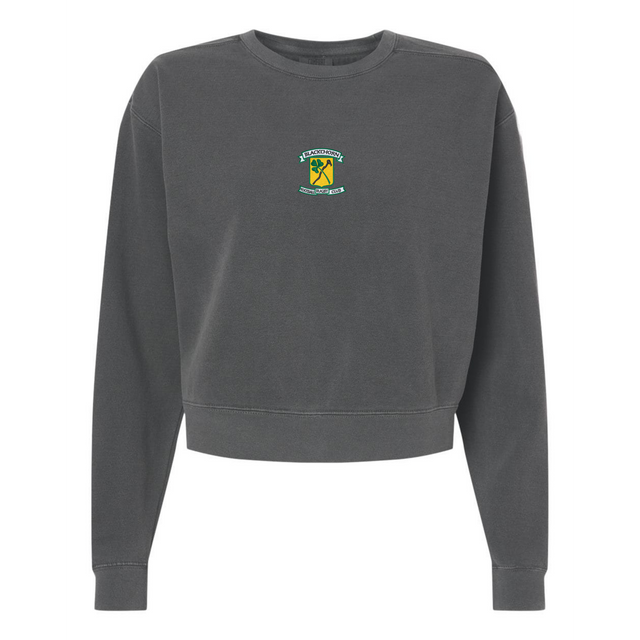 The EMB S&S Activewear Women's Blackthorn Rugby Mid-Length Crewneck Sweatshirt is cropped, garment-dyed charcoal gray, and displays a small colorful crest logo on the chest against a white background.