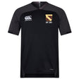The Conestoga Rugby Vapodri Evader Jersey by EMB Canterbury is a black short-sleeved rugby top with moisture-wicking tech, a Canterbury logo on the right chest, and a yellow "COMESTORA EST. 1971" shield on the left chest.