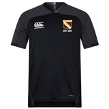 The Conestoga Rugby Vapodri Evader Jersey by EMB Canterbury is a black short-sleeved rugby top with moisture-wicking tech, a Canterbury logo on the right chest, and a yellow "COMESTORA EST. 1971" shield on the left chest.