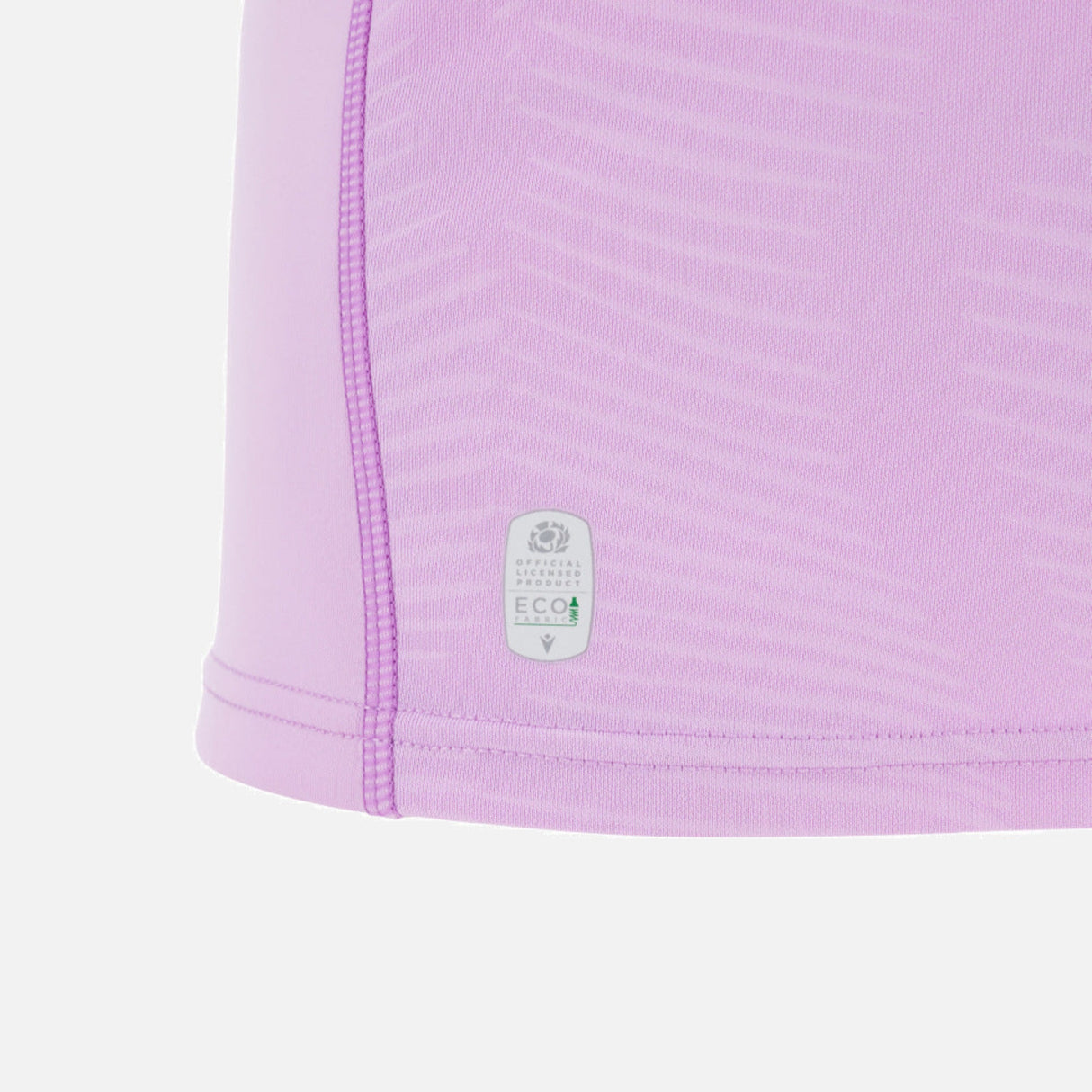 Close-up of the lower side of the light purple Scotland 25/26 Replica Away Jersey by Macron, showing visible stitching and an "ECOA" label that highlights its eco-friendly materials.
