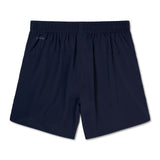 Navy blue Canterbury Elite Woven gym shorts with an elastic waistband and zippered pockets, featuring a small logo on the left thigh, displayed on a plain white background.