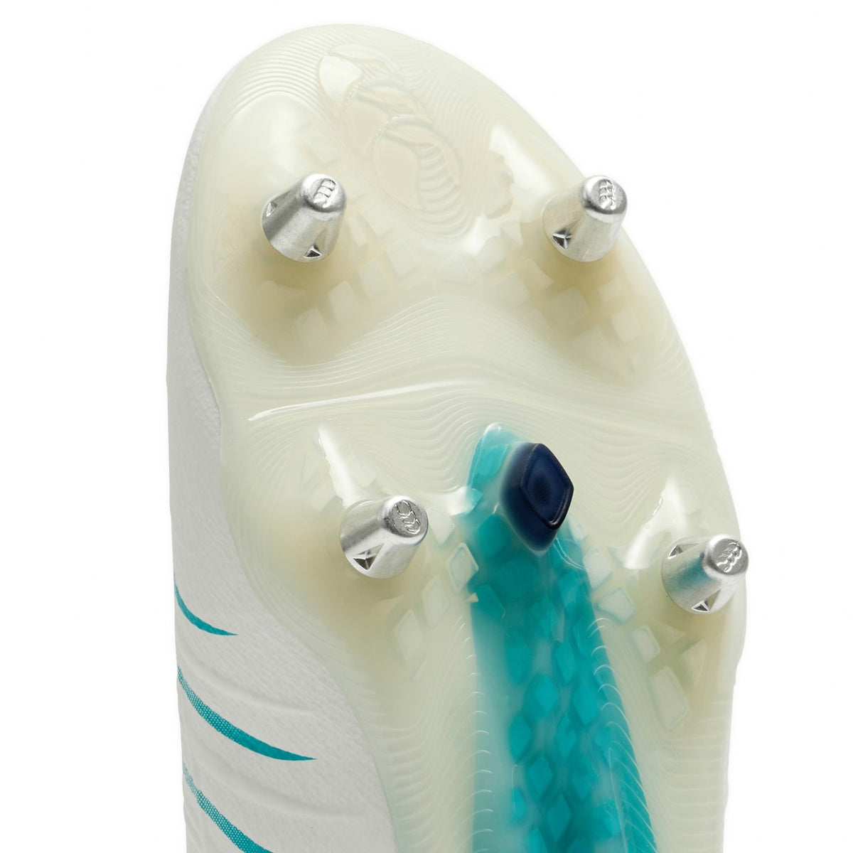 Close-up of the sole of a white and Baltic Green Canterbury Phoenix 2.0 Elite SG soft ground boot, featuring four silver metal studs.