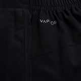 Close-up of black Canterbury Elite Woven gym short fabric with "vapor" logo embroidered in white.