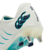 Close-up of the heel and sole of a Canterbury Phoenix 2.0 Elite SG - White/Baltic Green rugby boot with teal accents and metal studs.