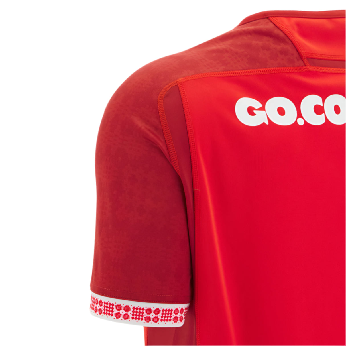 Back view of the Wales 25/26 Replica Home Jersey by Macron in red, showing white "GO.CO" text near the shoulder and a patterned trim on the sleeve.