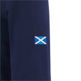 A small Scottish flag patch is sewn onto the sleeve of the navy Scotland SRU 25/26 Replica Home Long Sleeve Cotton Jersey by Macron, combining classic style and team pride.