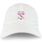 The Philly Whitemarsh RFC Adult Low-Profile Cotton Twill Dad Cap by EMB S&S Activewear features a classic white design with an embroidered red and white crest showing a bell, rugby player, and "Philadelphia Whitemarsh R.F.C. 1985.