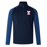 The Philly Whitemarsh RFC Elite First Layer by EMB Canterbury is a navy and royal blue quarter-zip long-sleeve pullover with a red, white, and blue bell-and-eagle logo—ideal for rugby training.