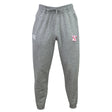 The Philly Whitemarsh RFC Leisure Sweatpant by EMB Canterbury features a drawstring waist, white logo on the left thigh, and pink and white graphics on the right—crafted from soft, sustainable organic cotton for comfort.