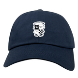 The EMB S&S Activewear Rugby Football Club at Christopher Newport University Adult Low-Profile Cotton Twill Dad Cap features a navy blue design with an embroidered white and black skull and crossbones crest, checkered pattern, and bold front text.