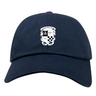The EMB S&S Activewear Rugby Football Club at Christopher Newport University Adult Low-Profile Cotton Twill Dad Cap features a navy blue design with an embroidered white and black skull and crossbones crest, checkered pattern, and bold front text.