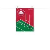 A PF LIC Rugby Canada Rugby Pitch Poster hanging on a clothesline.