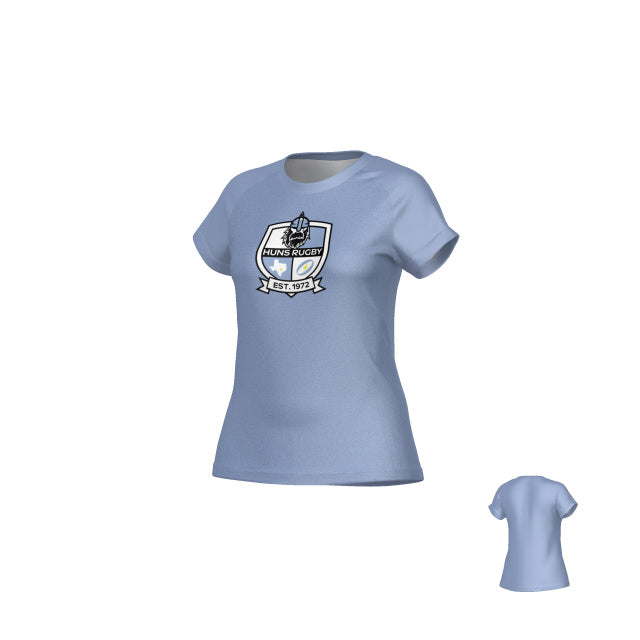 The Teamatical Austin Huns DNA Sydney Crew Performance Tee - Women's in light blue features a "Huns Rugby Est. 1972" crest on the front, shown from both sides, and provides moisture management for comfort during play.