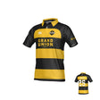 The Teamatical Chicago Riot Canterbury Kaha Regular Jersey - Hooped features black and yellow stripes, "Grand Union" on the front, a chest logo, and "Playername 25" on the back.