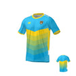 The NorCal REFEREE CCC MAKA JERSEY REGULAR by Teamatical features a blue and yellow gradient chevron pattern, a logo on the chest, and yellow accents on the sleeves and collar.