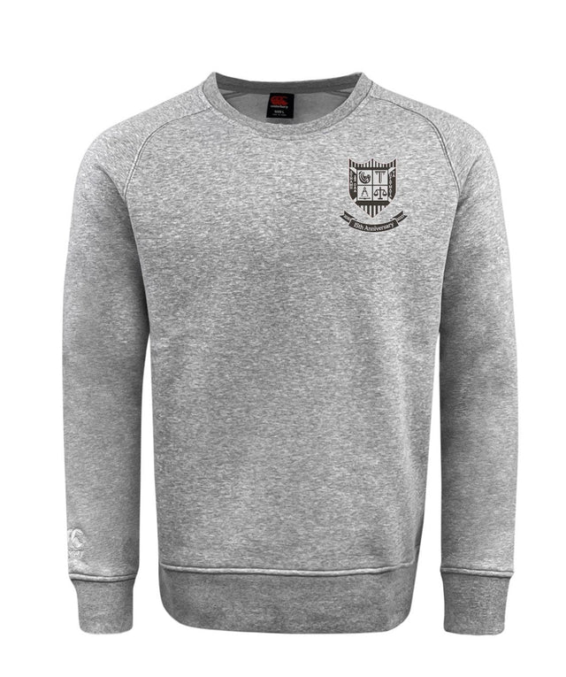 The Troy University RFC 15th Anniversary Club Crew Sweatshirt by WRS Canterbury is ultra-soft and gray, featuring a small embroidered crest on the left chest and an embroidered logo near the left cuff.