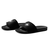 A pair of PF LIC Rugby Canada Men's slides with a Rugby Canada logo.