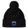Stay warm and stylish with the US Space Force Women's Rugby Pom Pom Beanie by EMB Canterbury, featuring a black fleece lining, pom-pom, and a front patch reading "United States Space Force Women's Rugby.