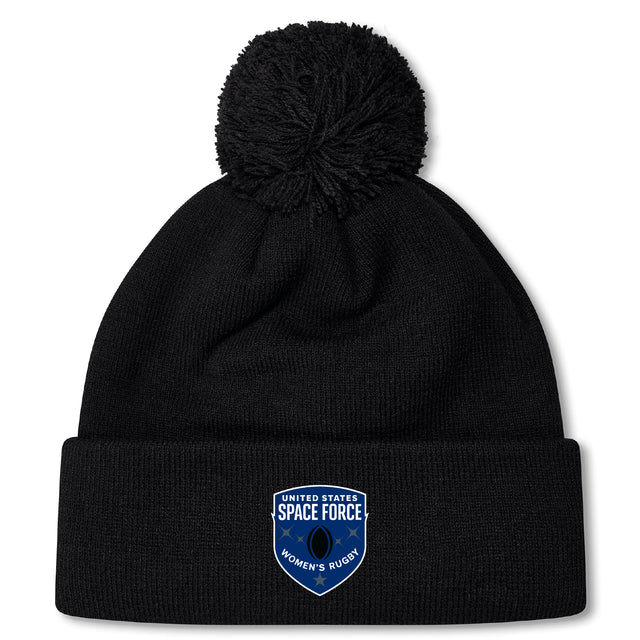 Stay warm and stylish with the US Space Force Women's Rugby Pom Pom Beanie by EMB Canterbury, featuring a black fleece lining, pom-pom, and a front patch reading "United States Space Force Women's Rugby.