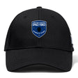 The EMB Canterbury US Space Force Women's Rugby Flexfit Drill Cap is a black cap with a blue and white team shield logo on the front.