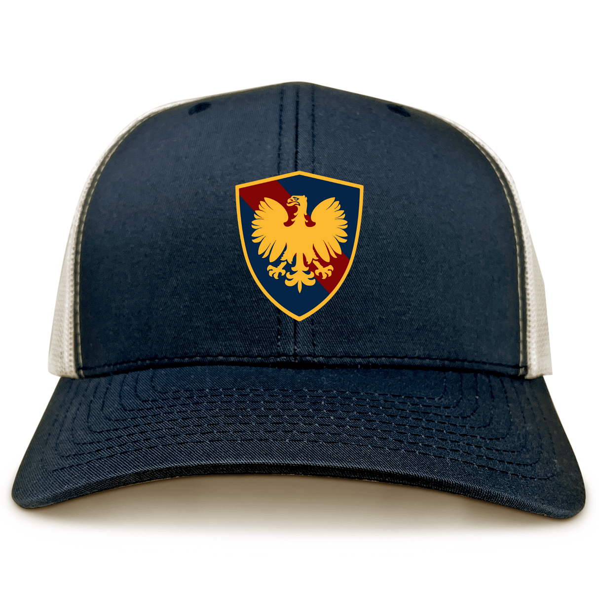 Cincinnati Classical Academy navy blue and white retro trucker cap with a shield emblem featuring a golden eagle on a red background by EMB Alpha Broder.