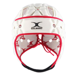 Front view of the Gilbert Air Headguard in white with red trim, featuring ventilation holes and "Gilbert" logo on the forehead; this lightweight headguard delivers comfort and protection.