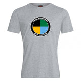 The SOCAL SANZAS RFC Club Plain Tee by WRS Canterbury is a gray premium cotton-blend T-shirt with a circular four-color logo and "Santa's International SoCal Rugby Club" text around the edge, ensuring comfort and style.