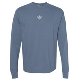 The EMB S&S Activewear Scotland Vintage Long Sleeve Comfort Tee features a blue crewneck design with a small white laurel wreath and "1977" on the upper chest, inspired by classic Scottish style.