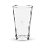 The Ireland Est 1875 Shaker Pint Glass by PF LIC is a clear, empty shaker pint glass adorned with a subtle logo featuring a shield and clover design etched on the front, perfect for any Ireland rugby fan.
