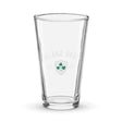 A clear Ireland Est 1875 Shaker Pint Glass from PF LIC showcases the Ireland Rugby logo, adorned with green shamrocks and the text "Ireland Rugby Est. 1875" on the front.
