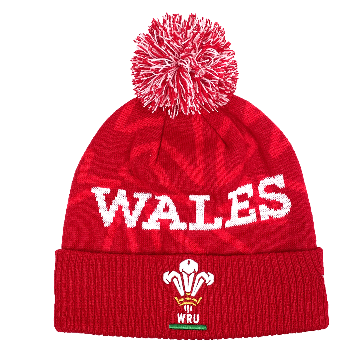 Red beanie with a white pom-pom from Fast Bundle's Welsh Fan Gift Set, featuring the "WALES" text and the Welsh Rugby Union logo on the cuff.