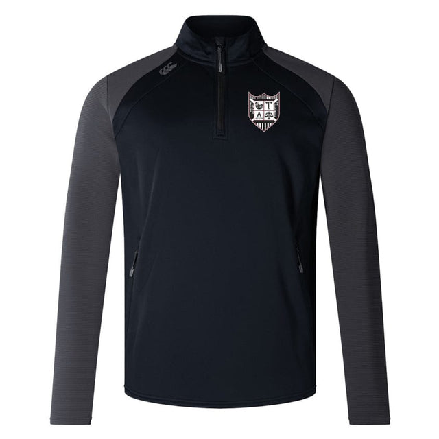 The Troy University Rugby Women's Elite First Layer by EMB Canterbury is a black and gray long-sleeve sports jacket featuring a quarter-zip front, a shield logo on the chest, and is crafted with honeycomb fabric for durability.