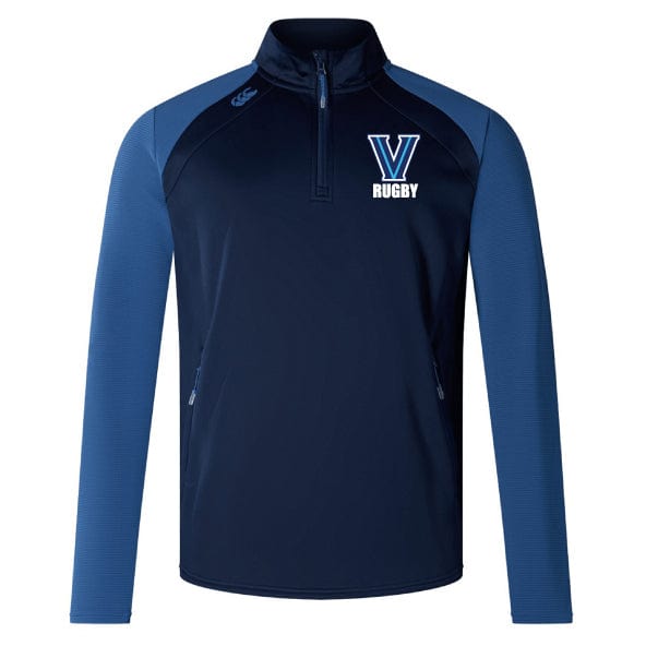 The Villanova Rugby Club 1/4 Zip Mid Layer Training Top by EMB Canterbury is a navy and blue fleece rugby training top with a quarter zip and features the "V Rugby" logo on the chest.