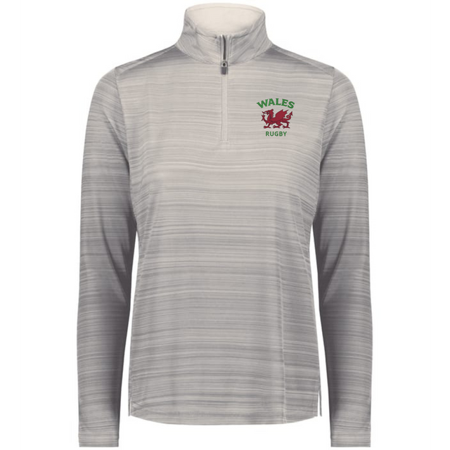 The EMB Augusta Women's Nations of Rugby Wales Pursuit 1/4 Zip Pullover is a light grey, long-sleeve athletic top with a "Wales Rugby" logo and red dragon on the chest, made from moisture-wicking fabric for comfort.