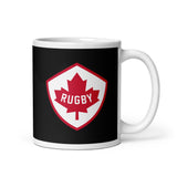 A black PF LIC Ceramic Cup with the word rugby on it, perfect for Rugby Canada fans and Canadian rugby fans.