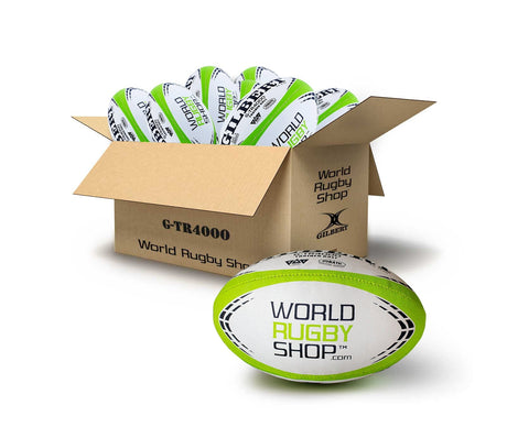 A Bundle-branded box labeled "Gilbert WRS G-TR4000 Rugby Training Ball BOX" holds several green and white training balls, with one ball outside the box displaying the "World Rugby Shop" logo.