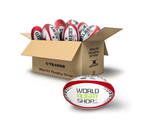 An open cardboard box labeled "World Rugby Shop" contains several Bundle Gilbert WRS G-TR4000 Rugby Training Balls, with one rugby training ball displayed in front of the box.