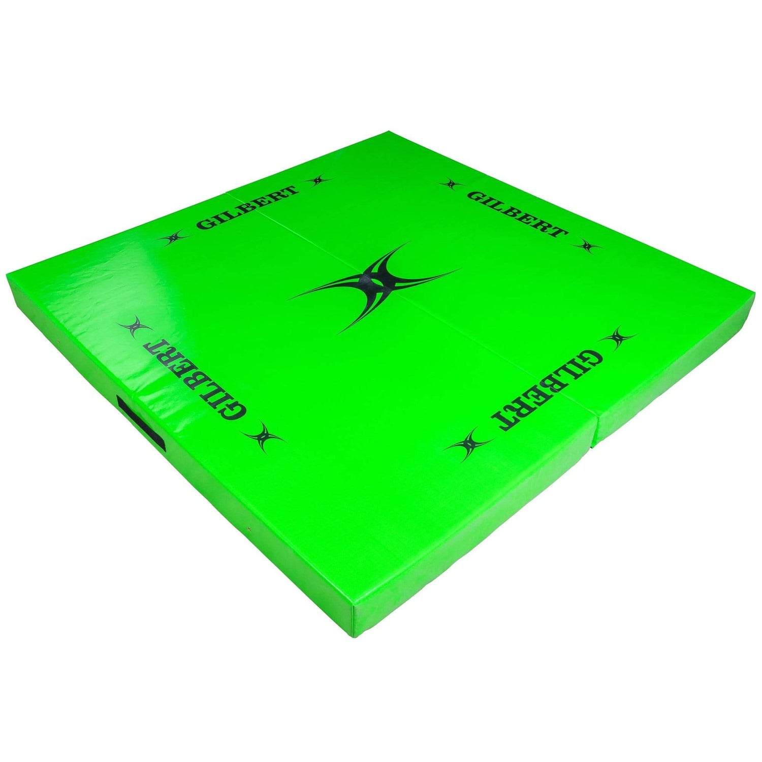 A Gilbert Rugby Green Tackle Mat with a black star on it.