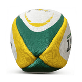 A detailed view of the South Africa Springboks Replica Mini Ball by Gilbert highlights its green, yellow, and white panels with textured surfaces. This vibrant design is perfect for demonstrating your support for the Springboks.