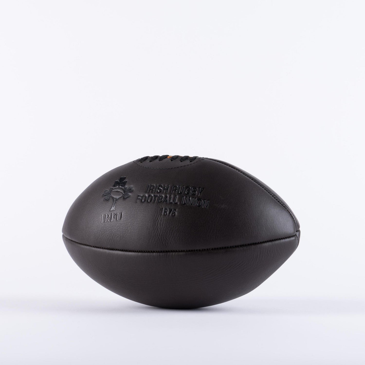 A black Ireland 1875 Vintage Leather Ball by Gilbert on a white background.