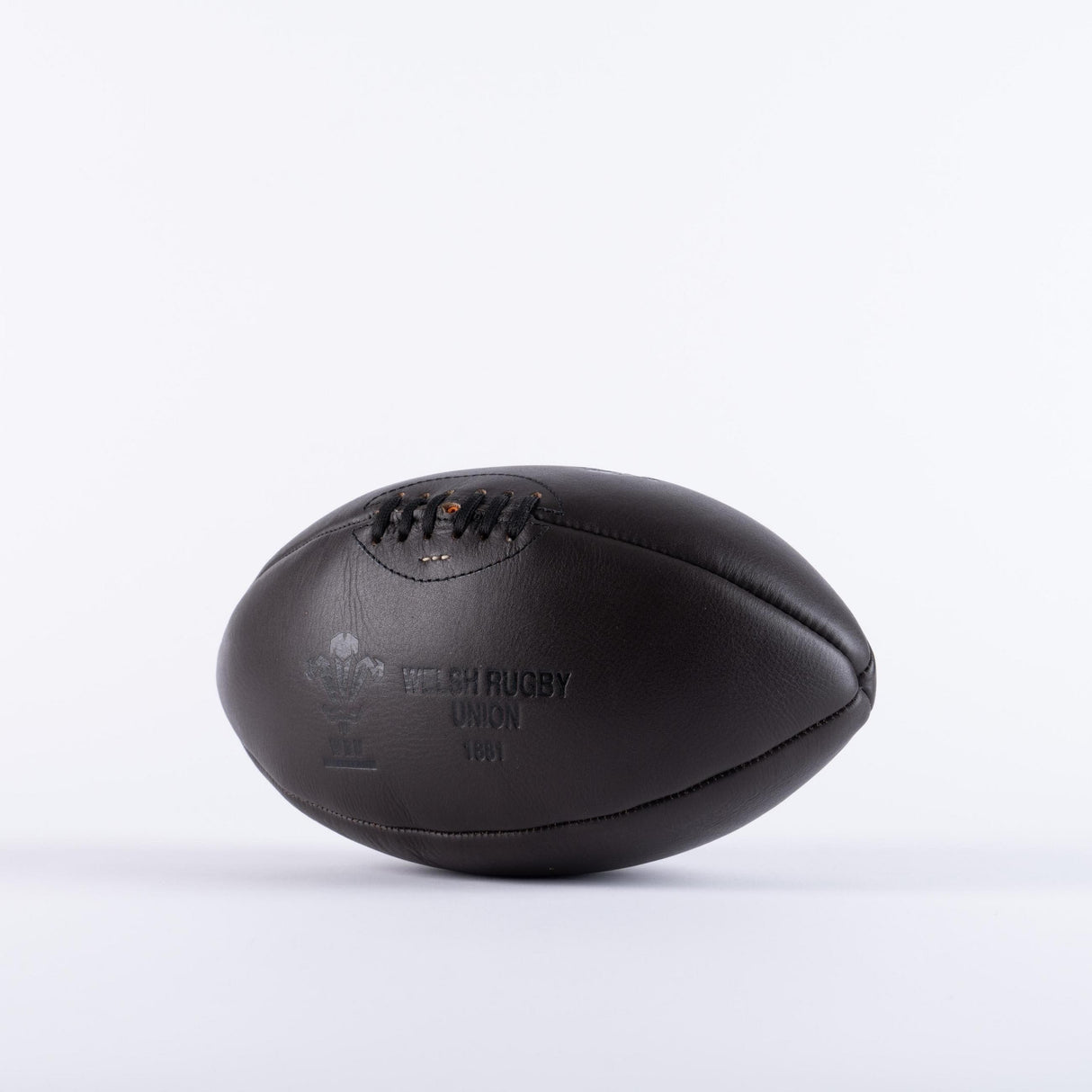 A Wales Rugby Vintage Leather Ball by Gilbert on a white background.