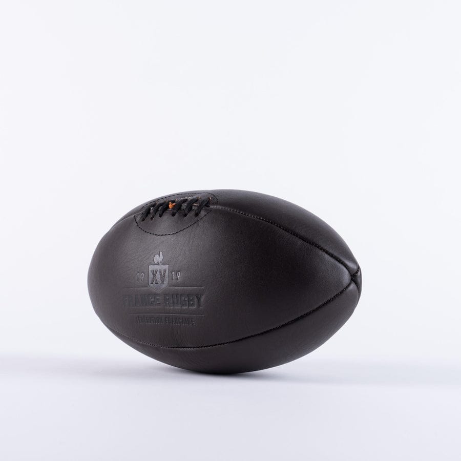 A France Vintage Leather Ball by Gilbert football on a white background.