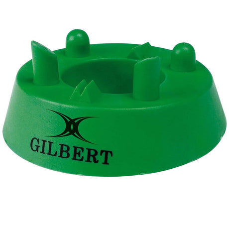 The Gilbert Rugby Kicking Tee 320 Precision, crafted by Gilbert from high-quality green rubber, features four raised supports and displays the iconic Gilbert logo on the side.