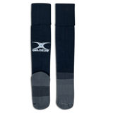 Long black rugby socks with Gilbert logo mid calf, gray foot with navy stripes on ankle and across the center of the sole.