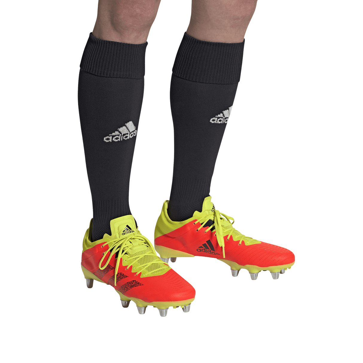 A soccer player wearing Adidas Kakari Z.0 SG - Solar Red shoes from adidas.