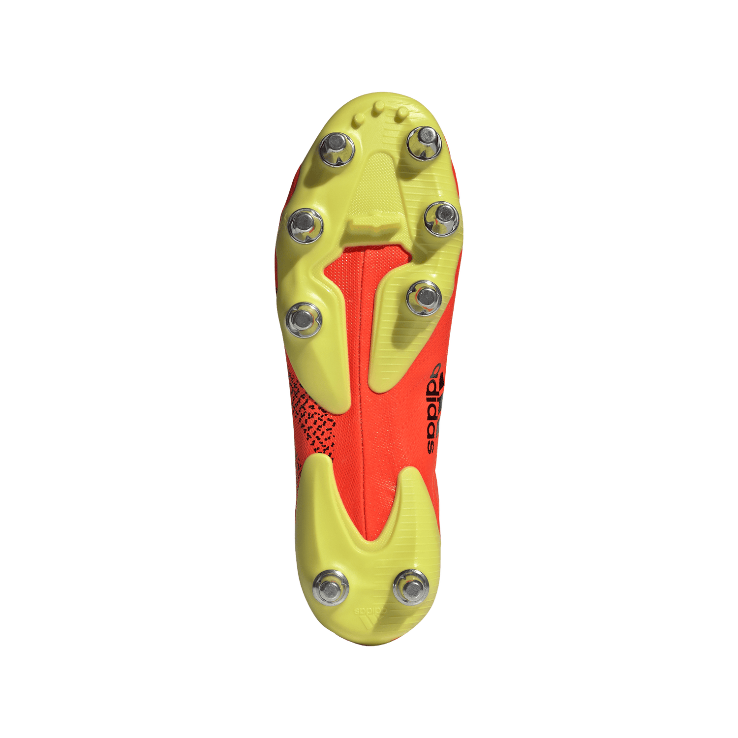 A pair of Adidas Kakari Z.0 SG - Solar Red shoes on a green background.