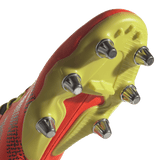 A close up of an adidas Kakari Z.0 SG - Solar Red soccer shoe with spikes.