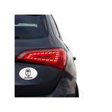 A close up of the World Rugby Shop Fiji Rugby Sticker Sheet - 24 Stickers on the tail light of a car.