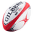 A Gilbert G-TR4000 Training Ball with the brand name Gilbert on it.