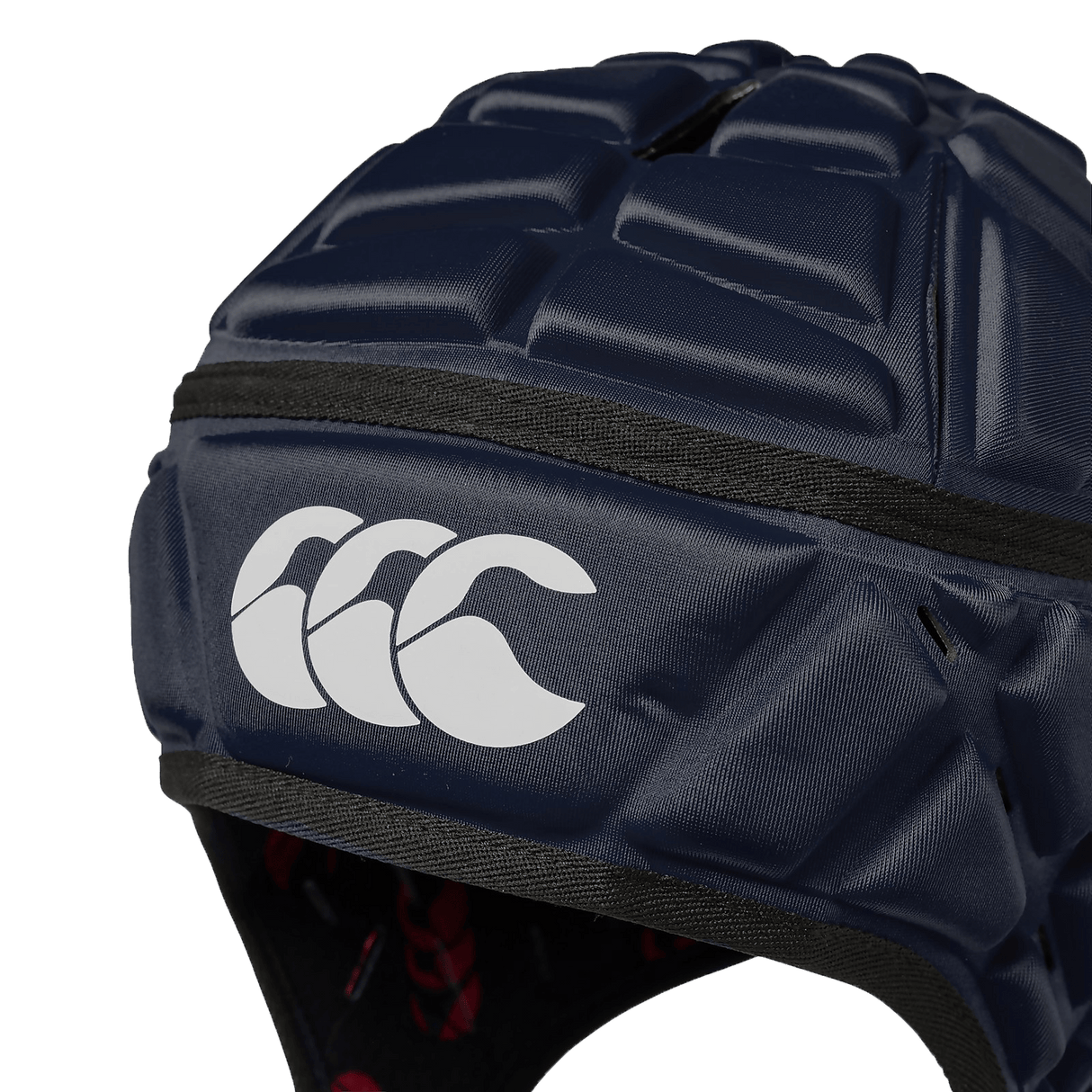 Navy padded scrum cap with white CCC logo on front and red CCC logo on lining inside.